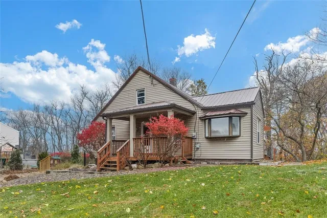 a front view of house with yard