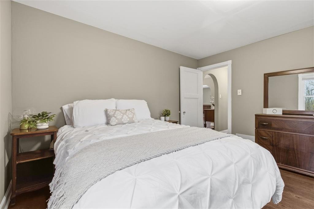 2609 Lah Road Gibsonia, PA 15044 - Photo 22 of 48 a bedroom with a bed and a large mirror on dresser