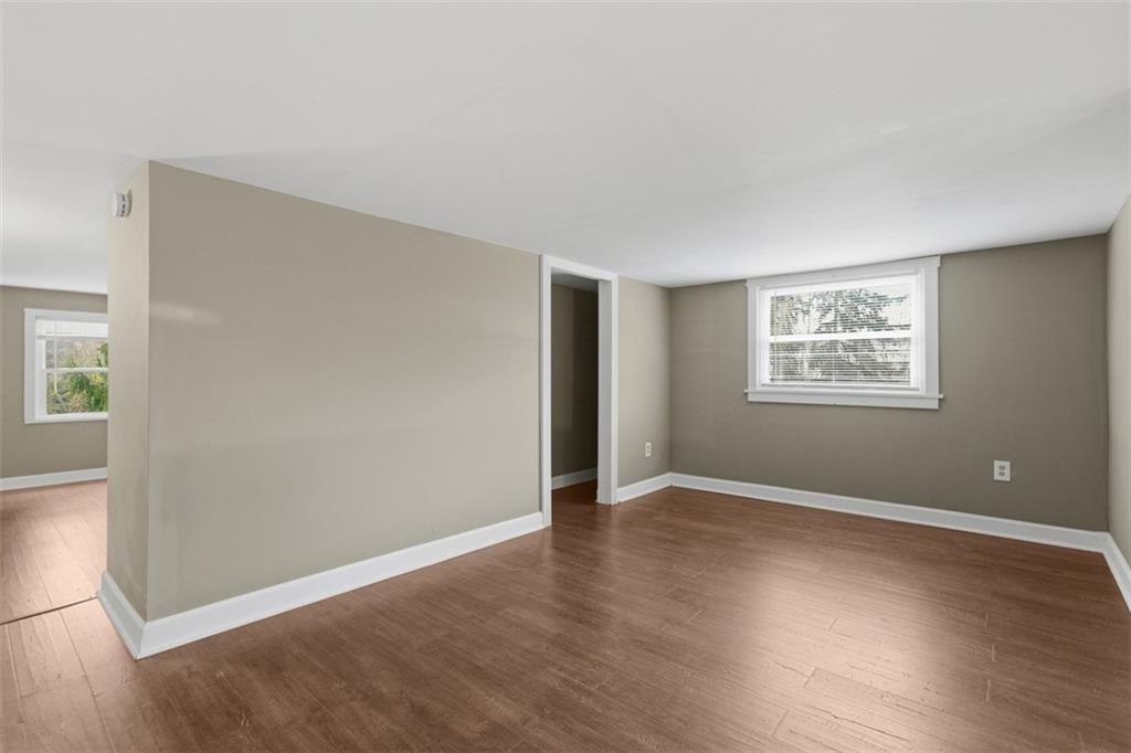 2609 Lah Road Gibsonia, PA 15044 - Photo 28 of 48 an empty room with wooden floor and windows