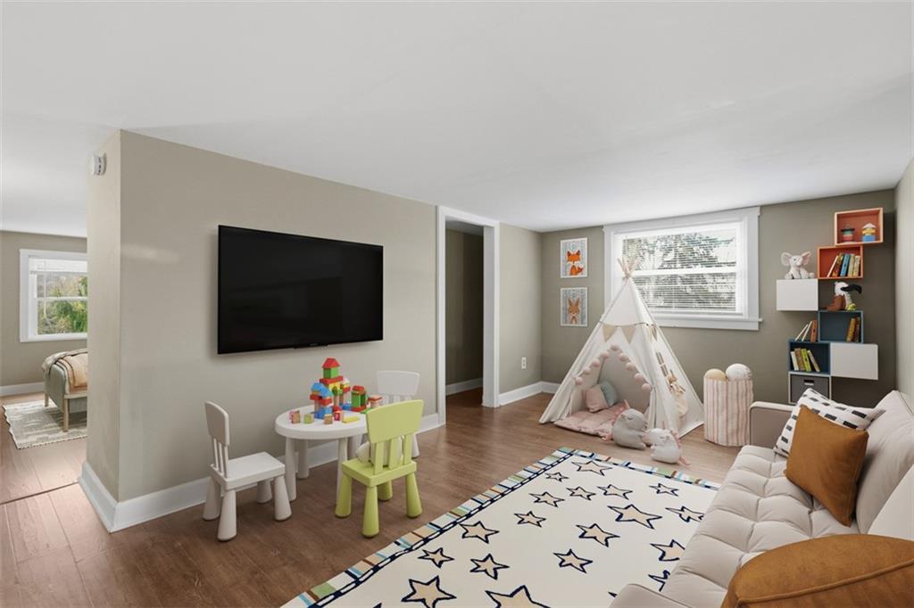 2609 Lah Road Gibsonia, PA 15044 - Photo 29 of 48 a living room with furniture and a flat screen tv