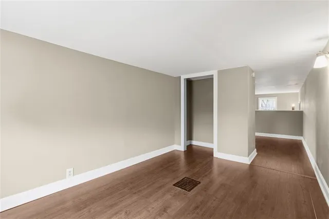 a view of front door of house with stairs