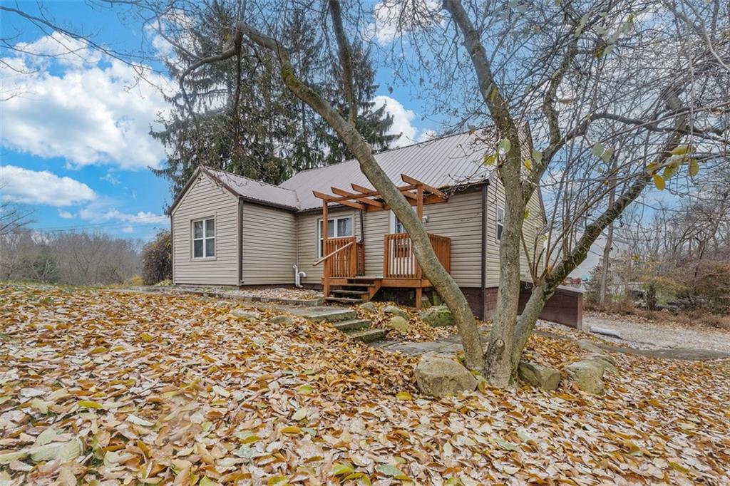 2609 Lah Road Gibsonia, PA 15044 - Photo 40 of 48 a house with a tree in the background