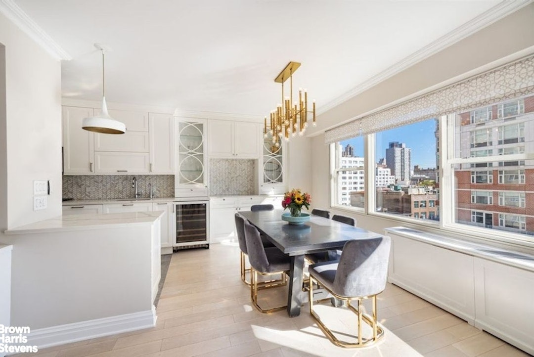 370 East 76th Street, Unit A1002 Manhattan, NY 10021 - Photo 3 of 13 a dining room with furniture and window