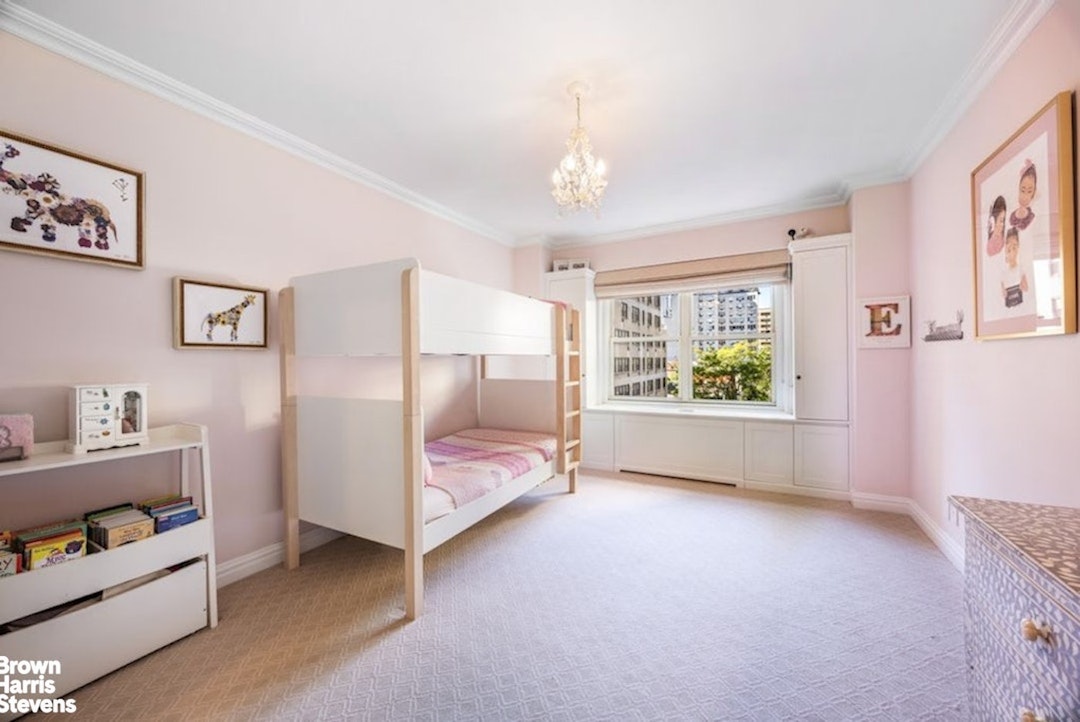370 East 76th Street, Unit A1002 Manhattan, NY 10021 - Photo 7 of 13 a view of a room with furniture window and a ceiling fan