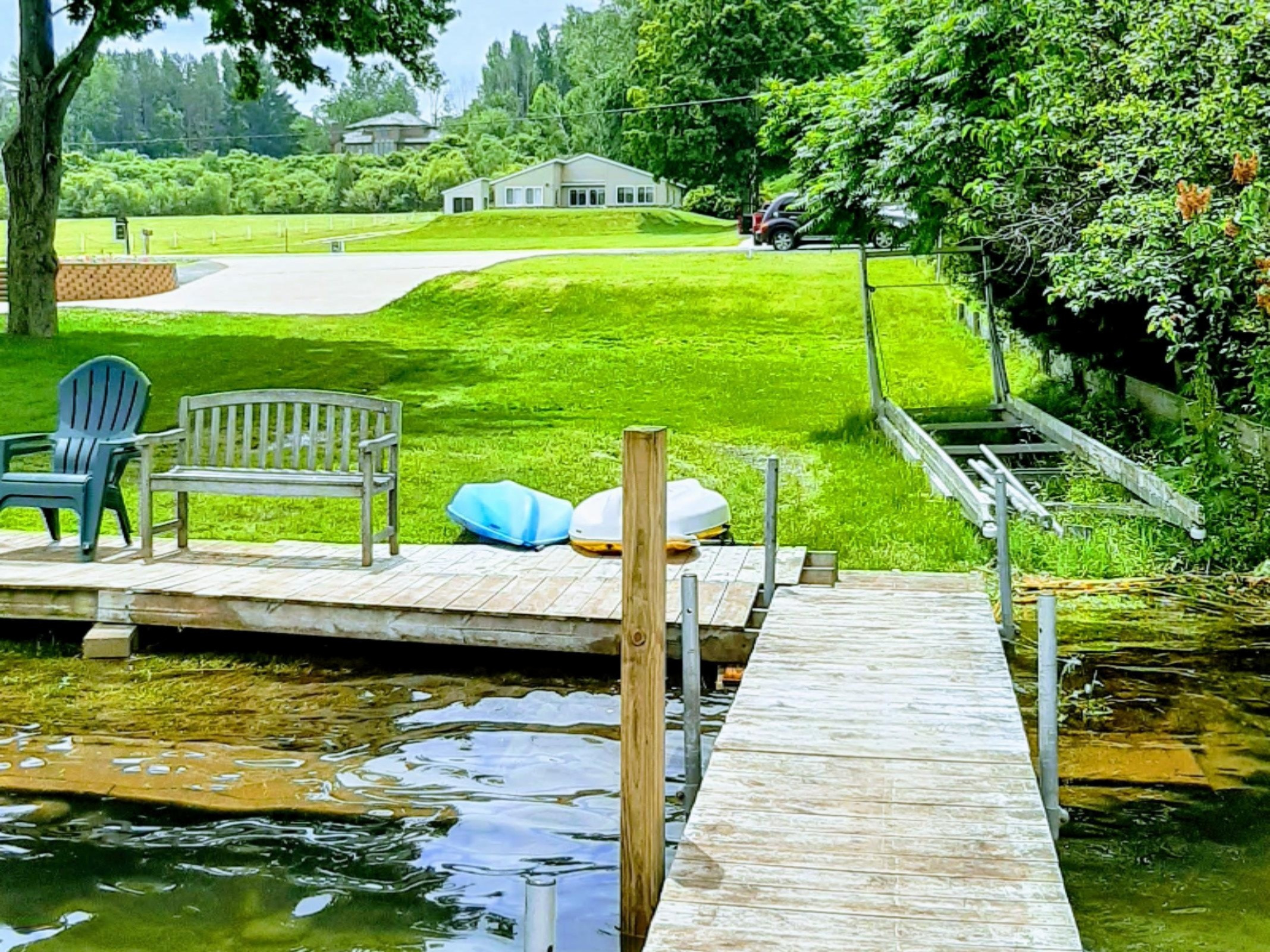 4519 Crescent Beach Road Onekama, MI 49675 - Photo 1 of 55 PORTAGE LAKE FRONTAGE w DOCK/BOAT SLIP!