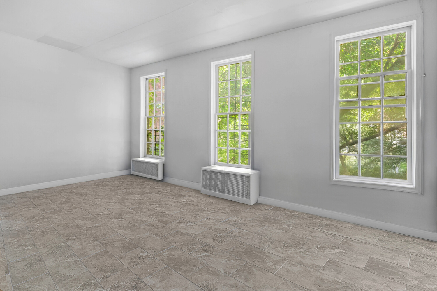 44 Barrow Street Manhattan, NY 10014 - Photo 6 of 10 an empty room with windows