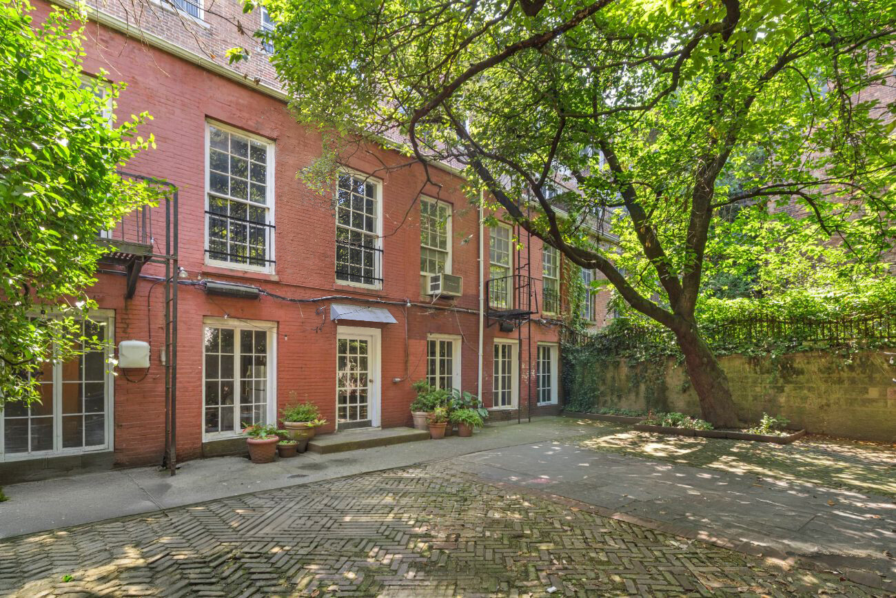 44 Barrow Street Manhattan, NY 10014 - Photo 9 of 10 front view of a building with a street