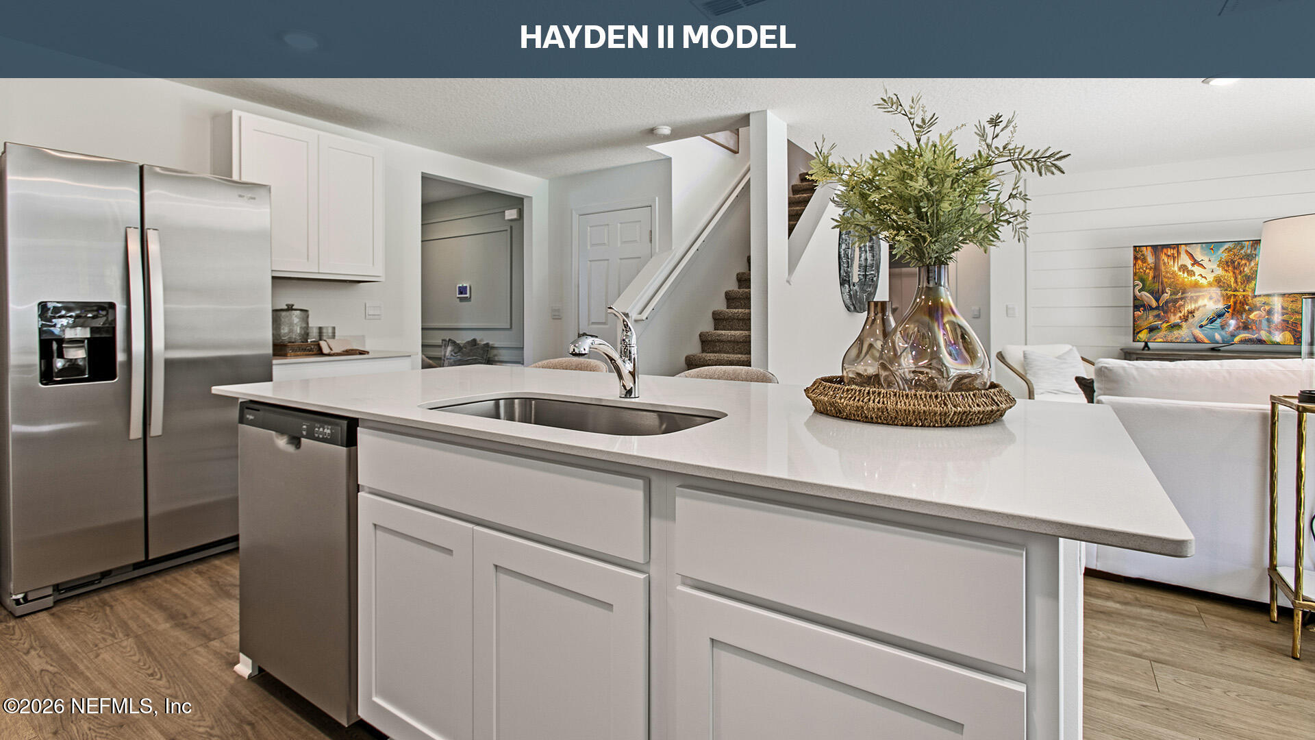 12438 Russian Olive Road Jacksonville, FL 32218 - Photo 12 of 66 a kitchen with a sink and a refrigerator