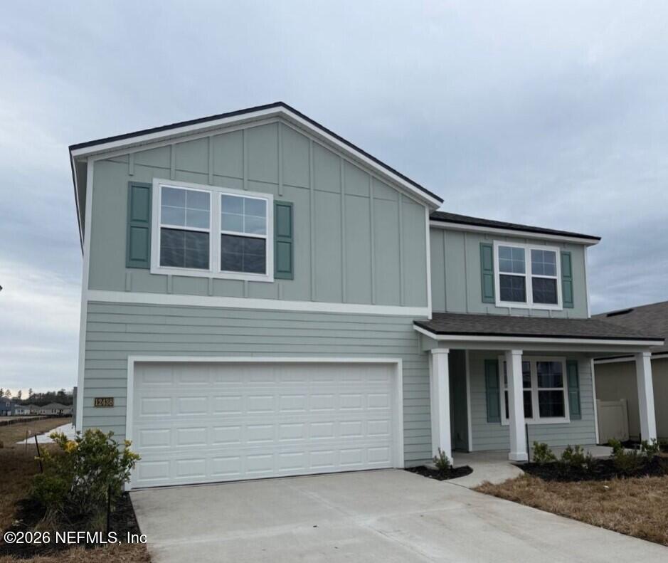 12438 Russian Olive Road Jacksonville, FL 32218 - Photo 2 of 66 a front view of a house