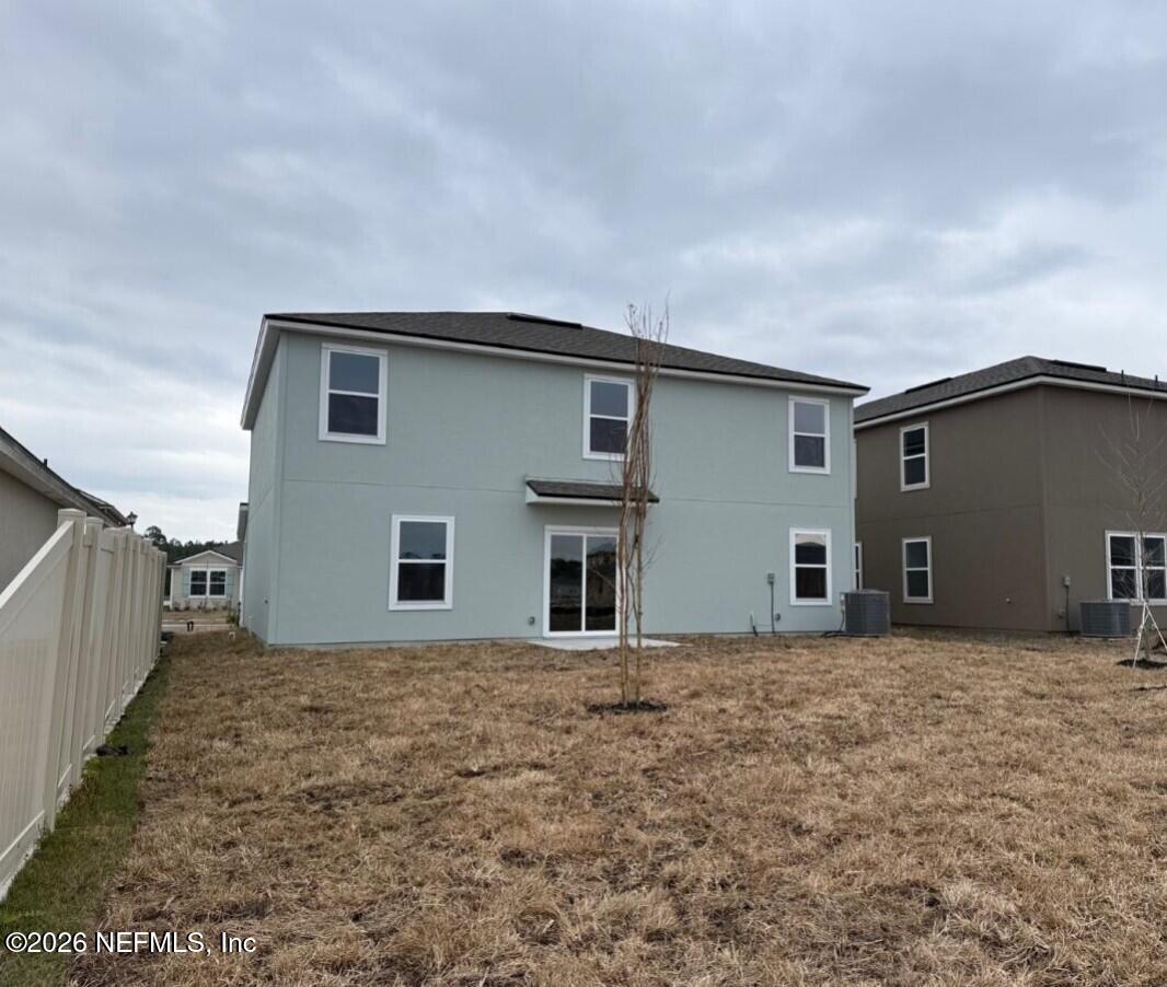 12438 Russian Olive Road Jacksonville, FL 32218 - Photo 37 of 66 a house with yard in front of it