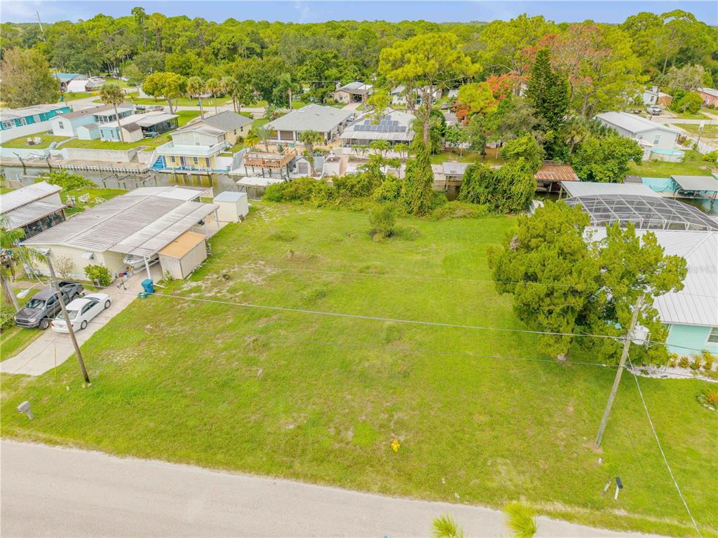 113 Charles Street Edgewater, FL 32141 - Photo 11 of 23 an aerial view of residential houses with outdoor space and swimming pool