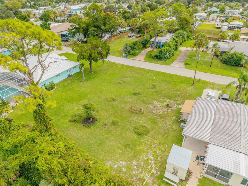 113 Charles Street Edgewater, FL 32141 - Photo 12 of 23 a view of an outdoor space and a yard