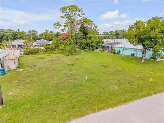 a view of a lake with a houses