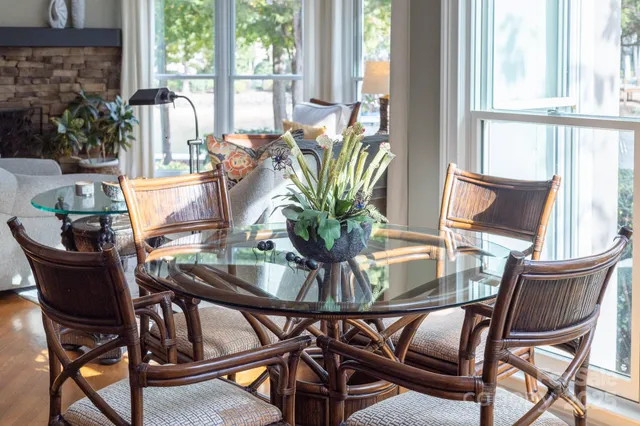 a view of a dining room with furniture window and outside view