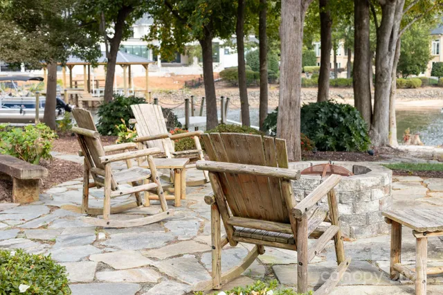 a view of yard with patio