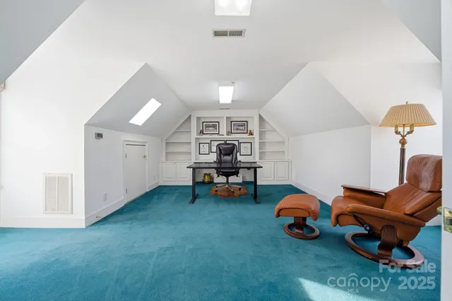 a view of a lake with table and chair
