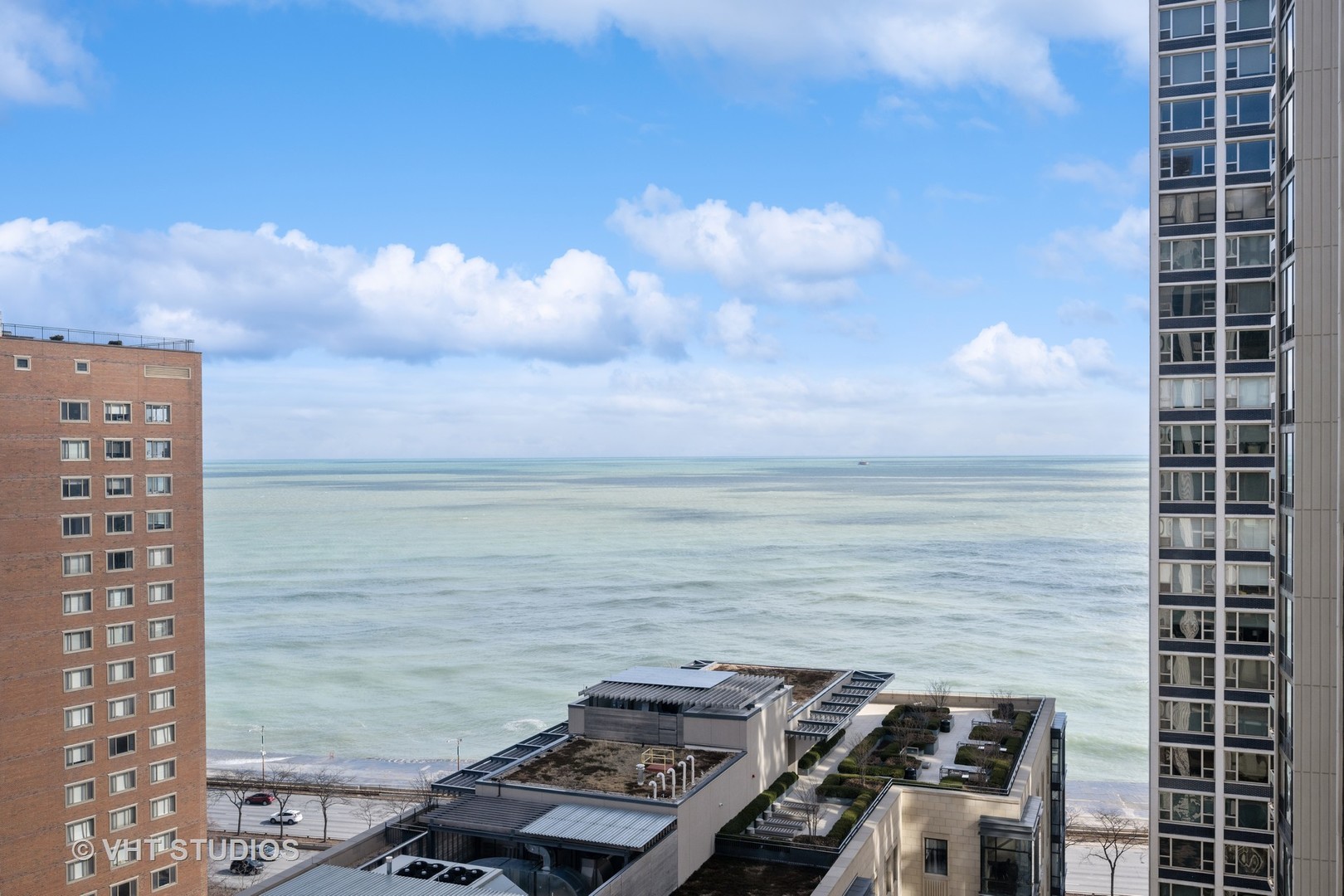 1310 North Ritchie Court, Unit 19C Chicago, IL 60610 - Photo 10 of 10 a view of ocean with a multi story building