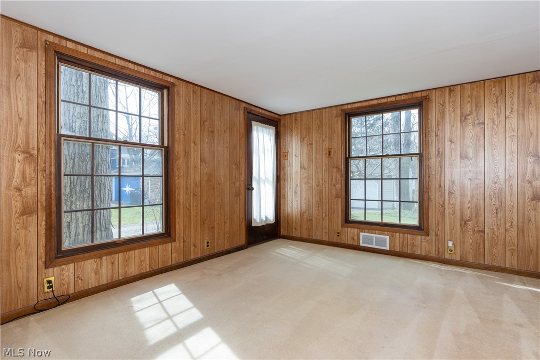 1050 Renfield Road Cleveland Heights, OH 44121 - Photo 15 of 41 Flex room with light carpet and wooden walls