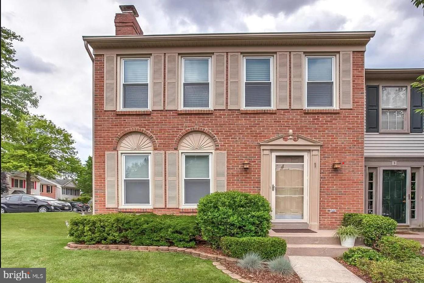 1 Second Tee Court Baltimore, MD 21209 - Photo 1 of 41 front view of a house with a yard