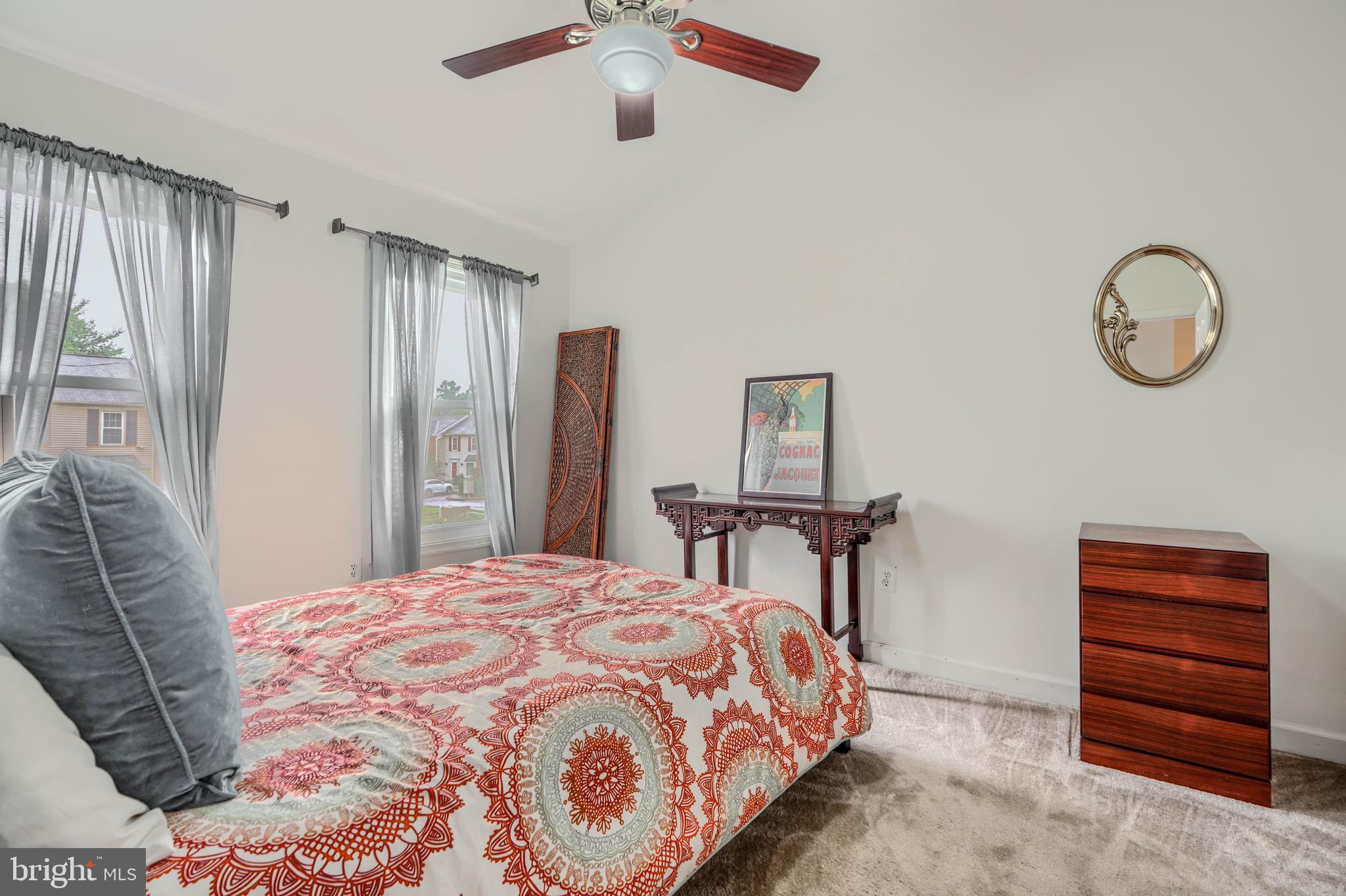 1 Second Tee Court Baltimore, MD 21209 - Photo 26 of 41 a bedroom with a bed and a dresser