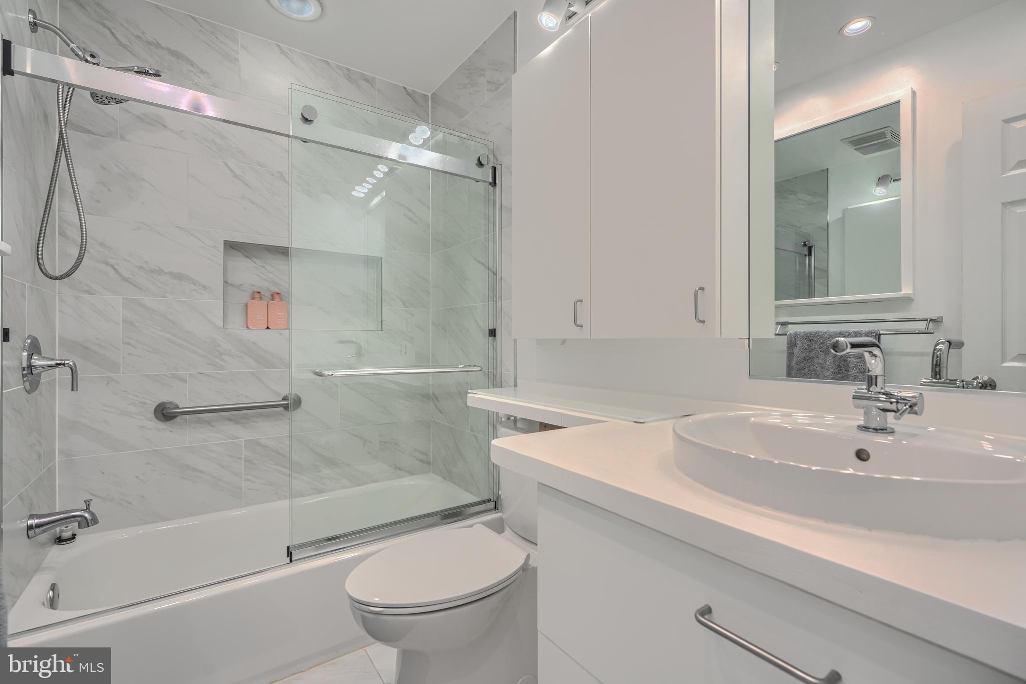 1 Second Tee Court Baltimore, MD 21209 - Photo 28 of 41 a bathroom with a sink a toilet and shower