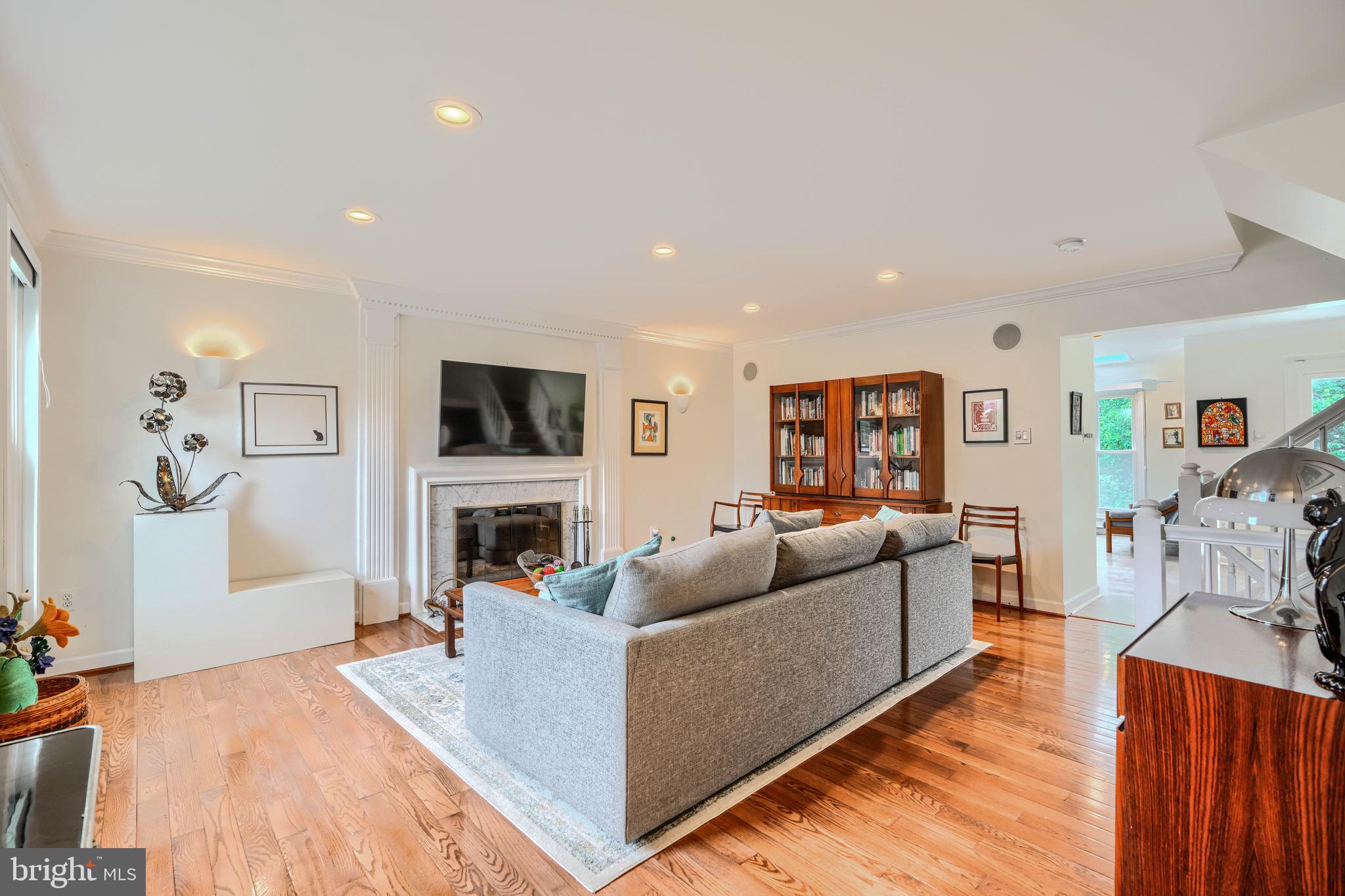 1 Second Tee Court Baltimore, MD 21209 - Photo 3 of 41 a living room with fireplace furniture and a flat screen tv