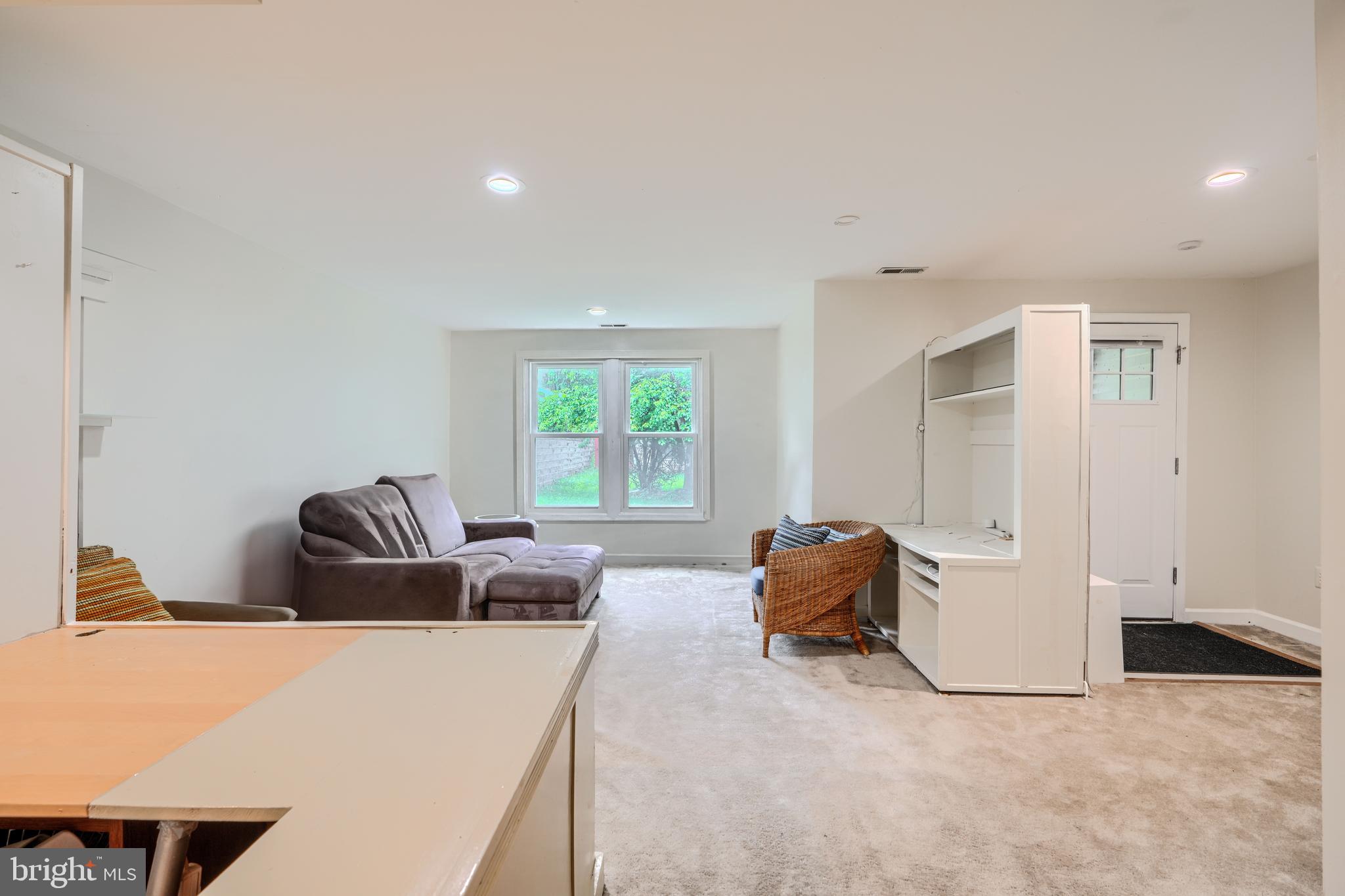 1 Second Tee Court Baltimore, MD 21209 - Photo 32 of 41 a living room with furniture and a window