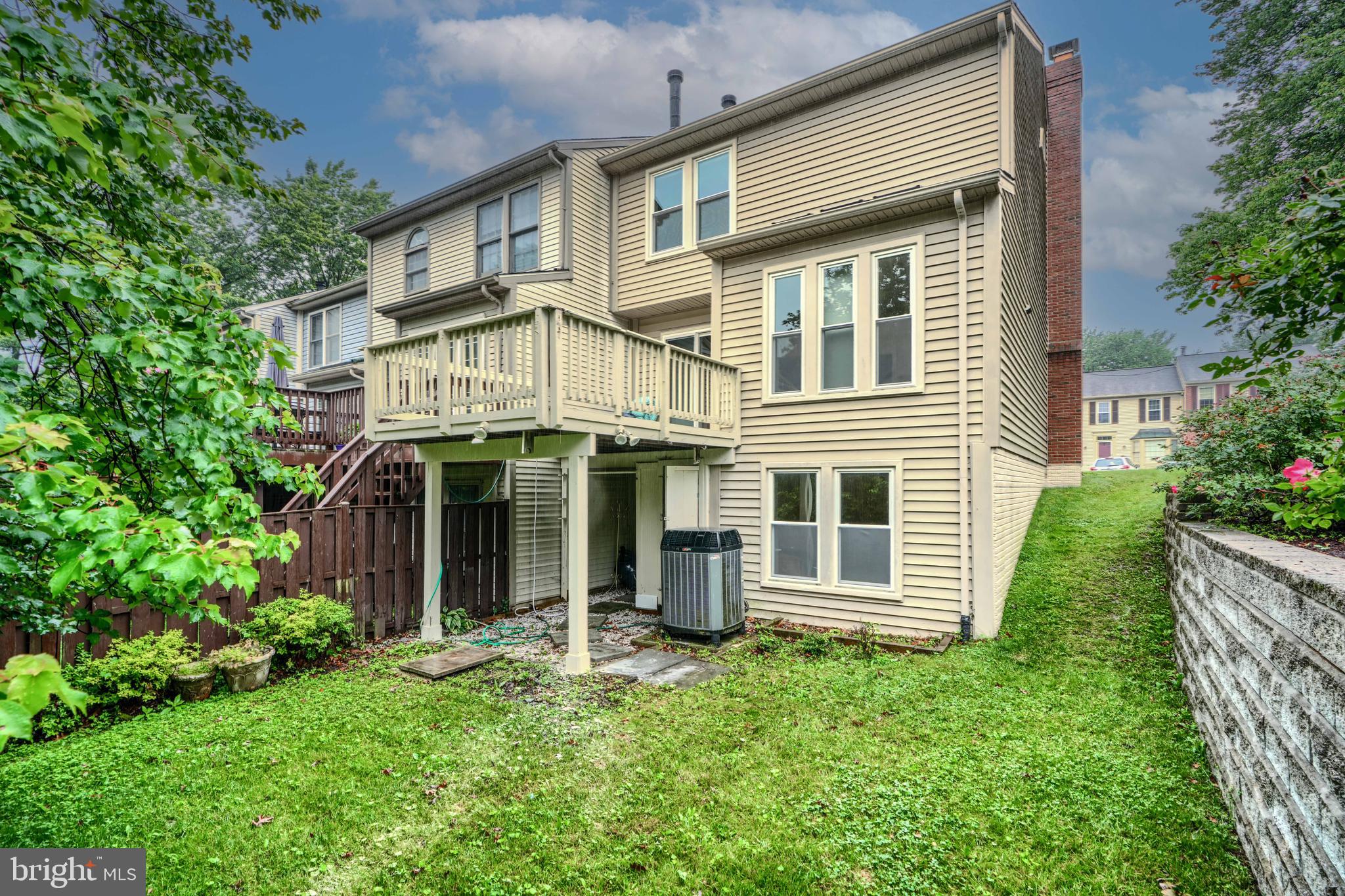 1 Second Tee Court Baltimore, MD 21209 - Photo 39 of 41 front view of a house with a yard