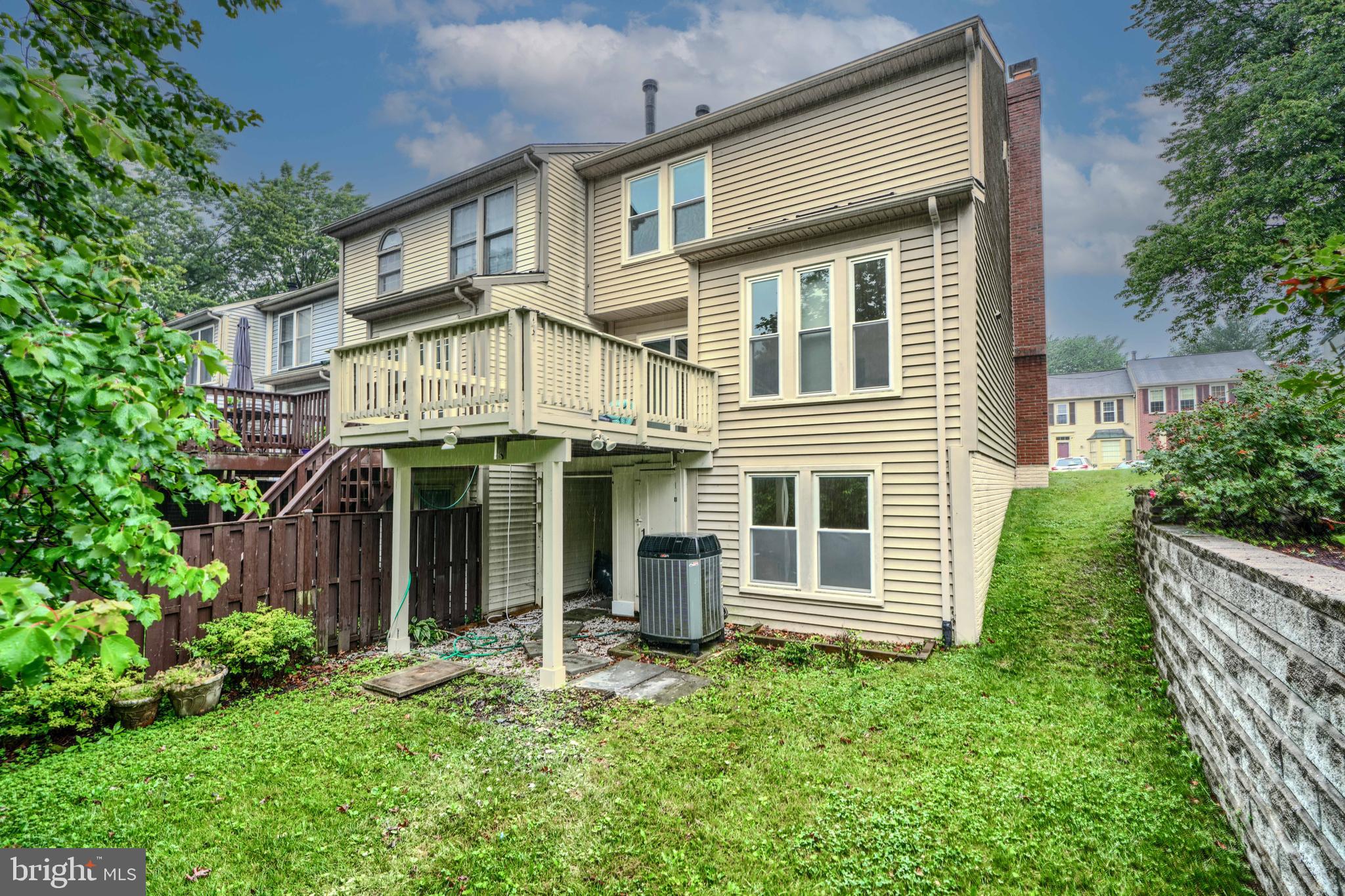 1 Second Tee Court Baltimore, MD 21209 - Photo 40 of 41 front view of a house with a yard