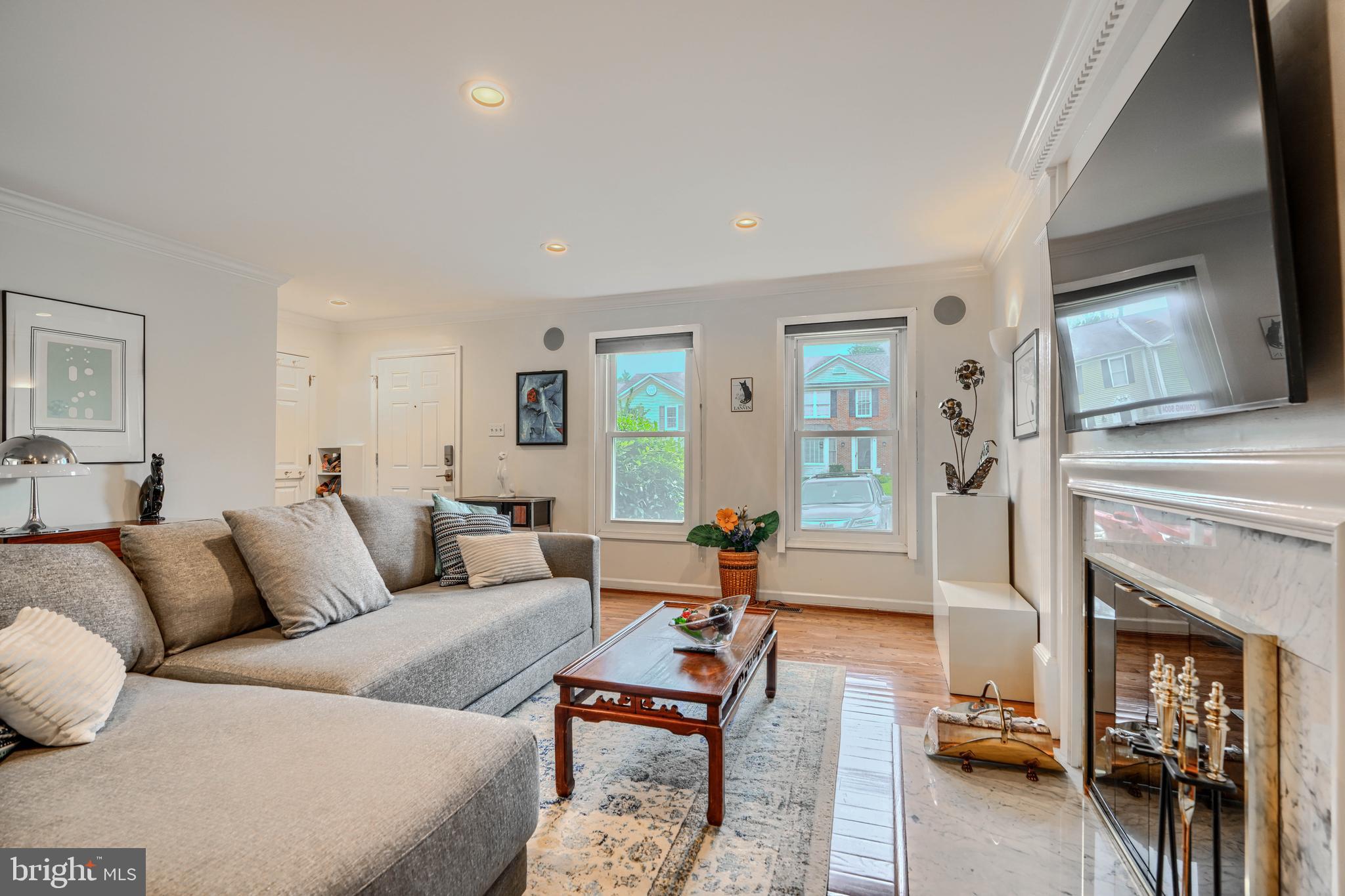 1 Second Tee Court Baltimore, MD 21209 - Photo 6 of 41 a living room with furniture and a fireplace