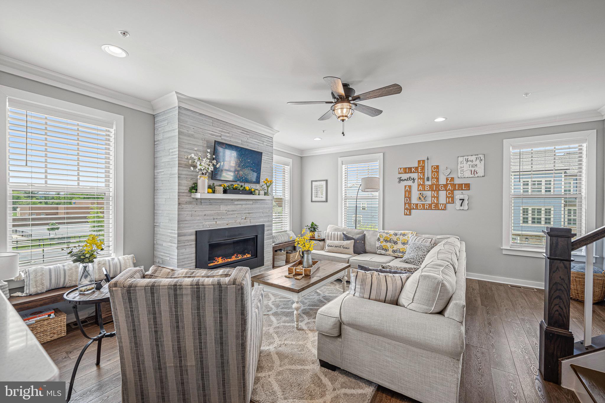 3451 Flatwoods Drive Frederick, MD 21704 - Photo 16 of 43 a living room with furniture and a fireplace