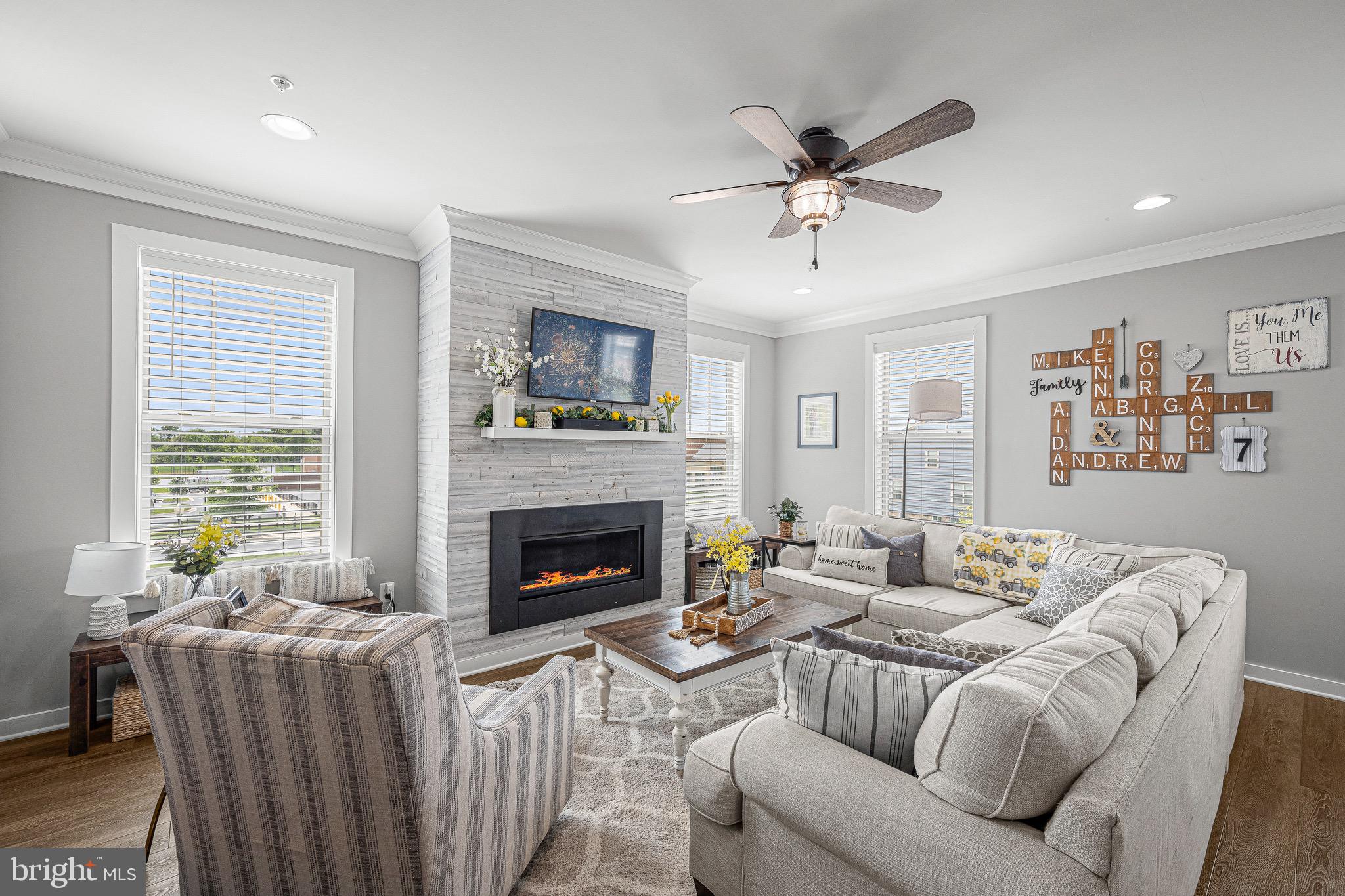 3451 Flatwoods Drive Frederick, MD 21704 - Photo 17 of 43 a living room with furniture and a fireplace
