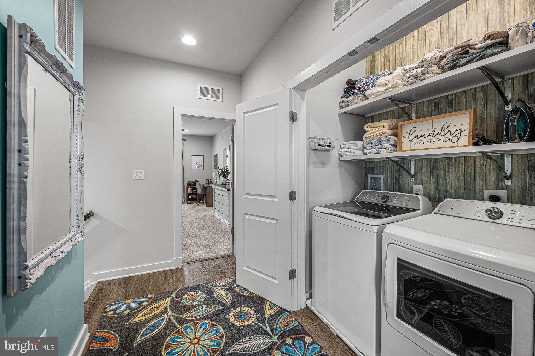 3451 Flatwoods Drive Frederick, MD 21704 - Photo 23 of 43 a kitchen with a stove and a refrigerator