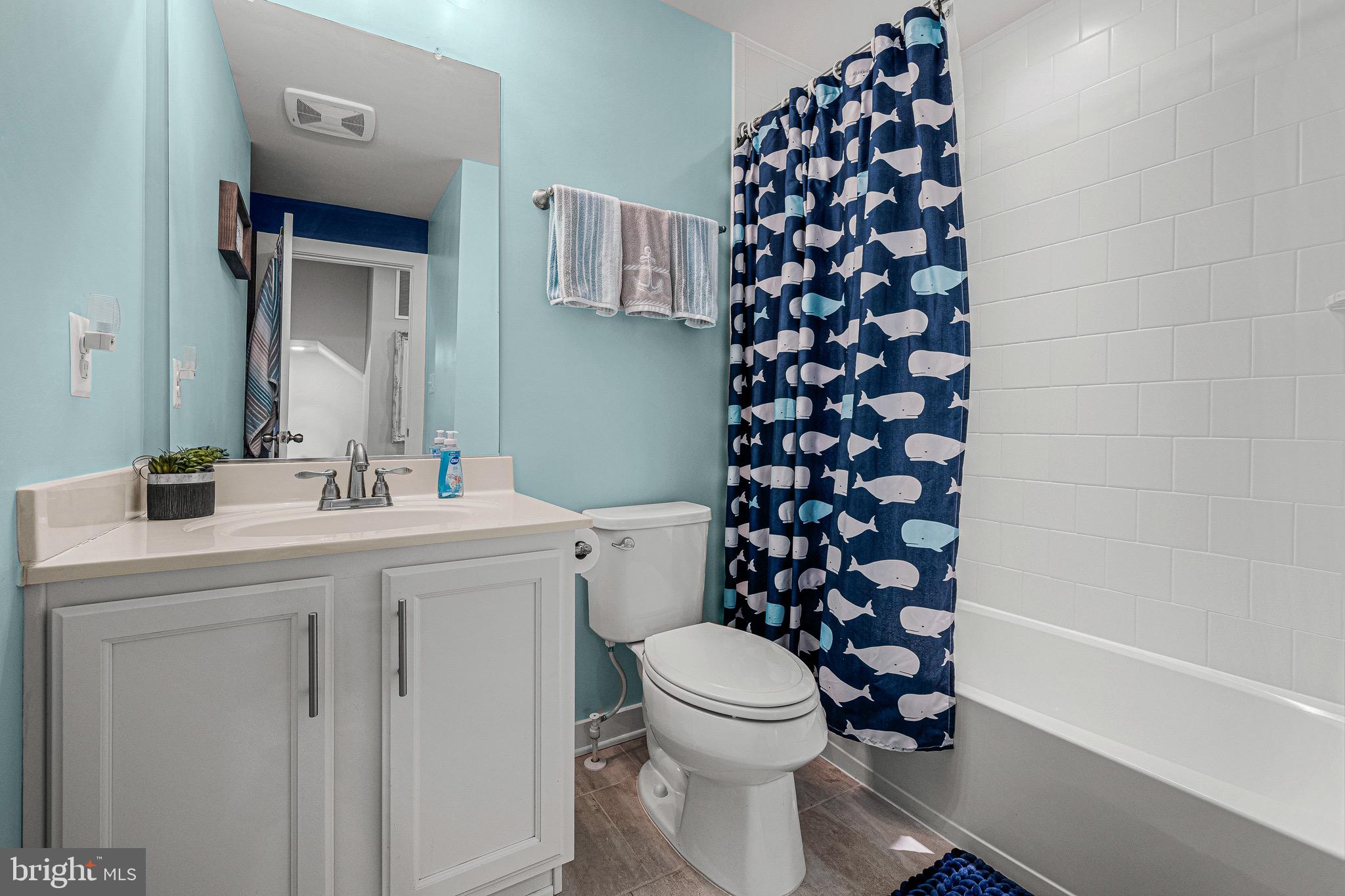 3451 Flatwoods Drive Frederick, MD 21704 - Photo 24 of 43 a bathroom with a sink a toilet and shower
