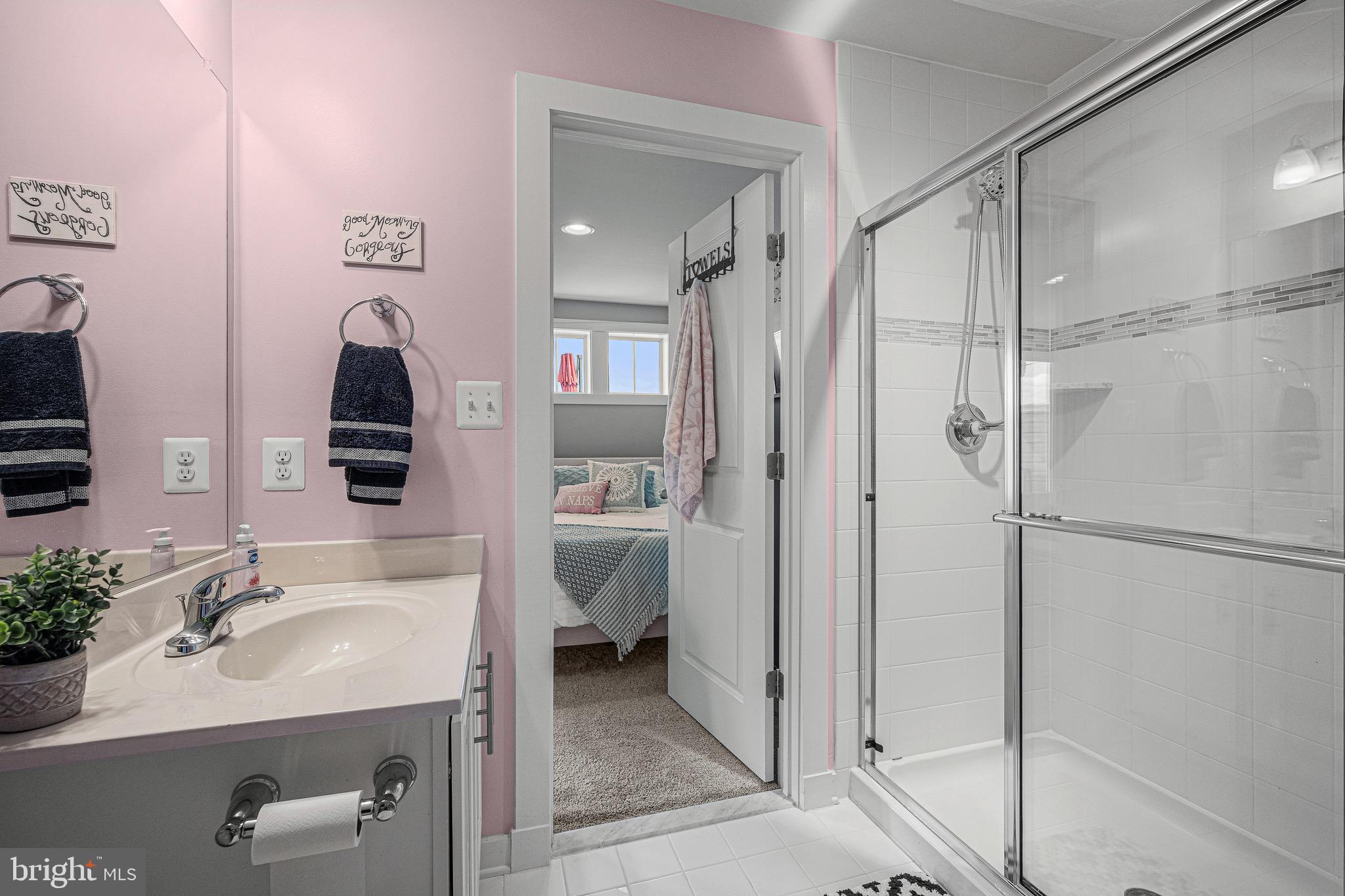 3451 Flatwoods Drive Frederick, MD 21704 - Photo 32 of 43 a bathroom with a sink and a mirror