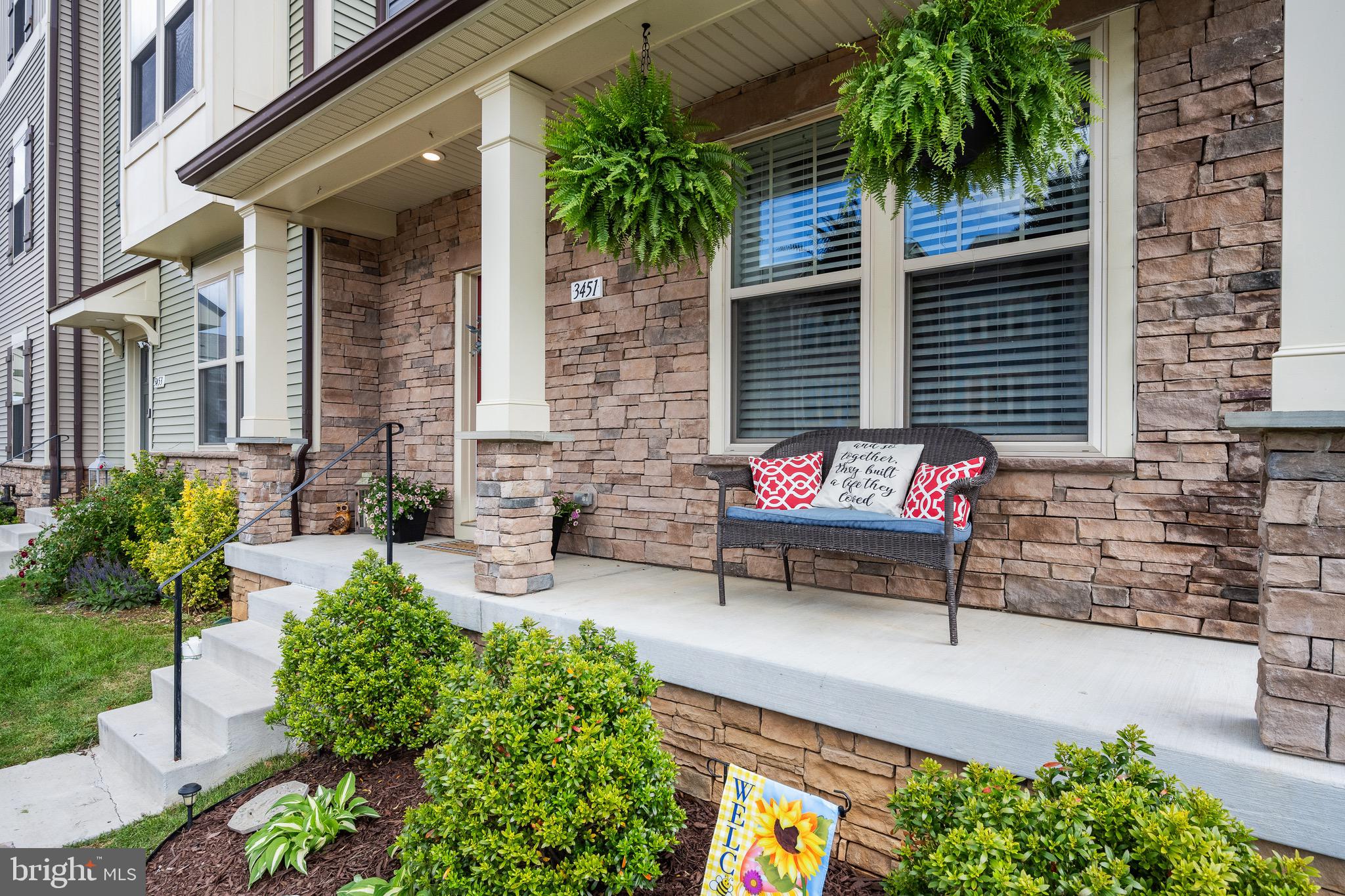 3451 Flatwoods Drive Frederick, MD 21704 - Photo 4 of 43 a bench sitting in front of a house