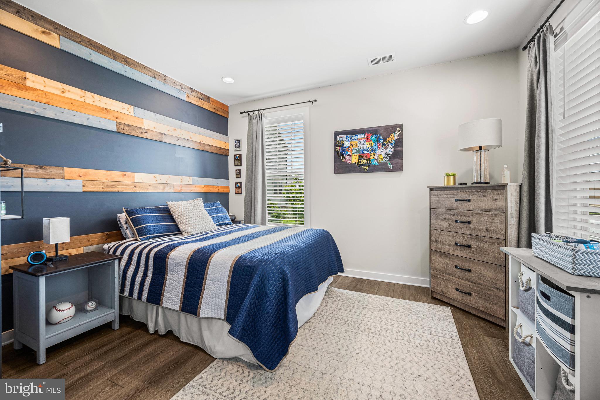 3451 Flatwoods Drive Frederick, MD 21704 - Photo 6 of 43 a bedroom with a bed and a cabinets