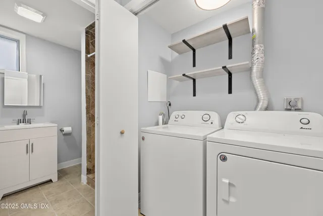 a utility room with dryer and washer