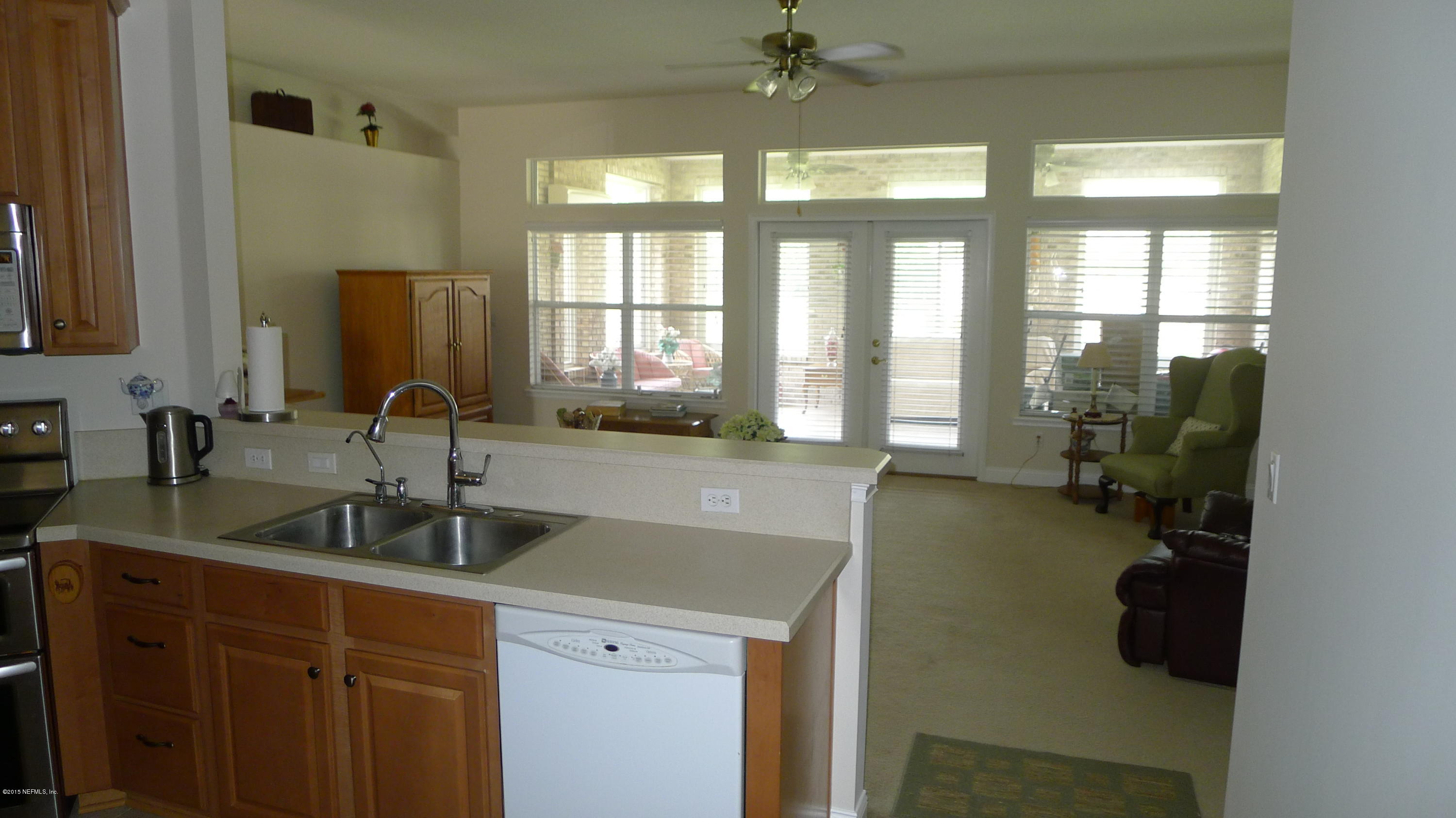 1527 Falkland Road East Jacksonville, FL 32221 - Photo 12 of 26 kitchen to family room