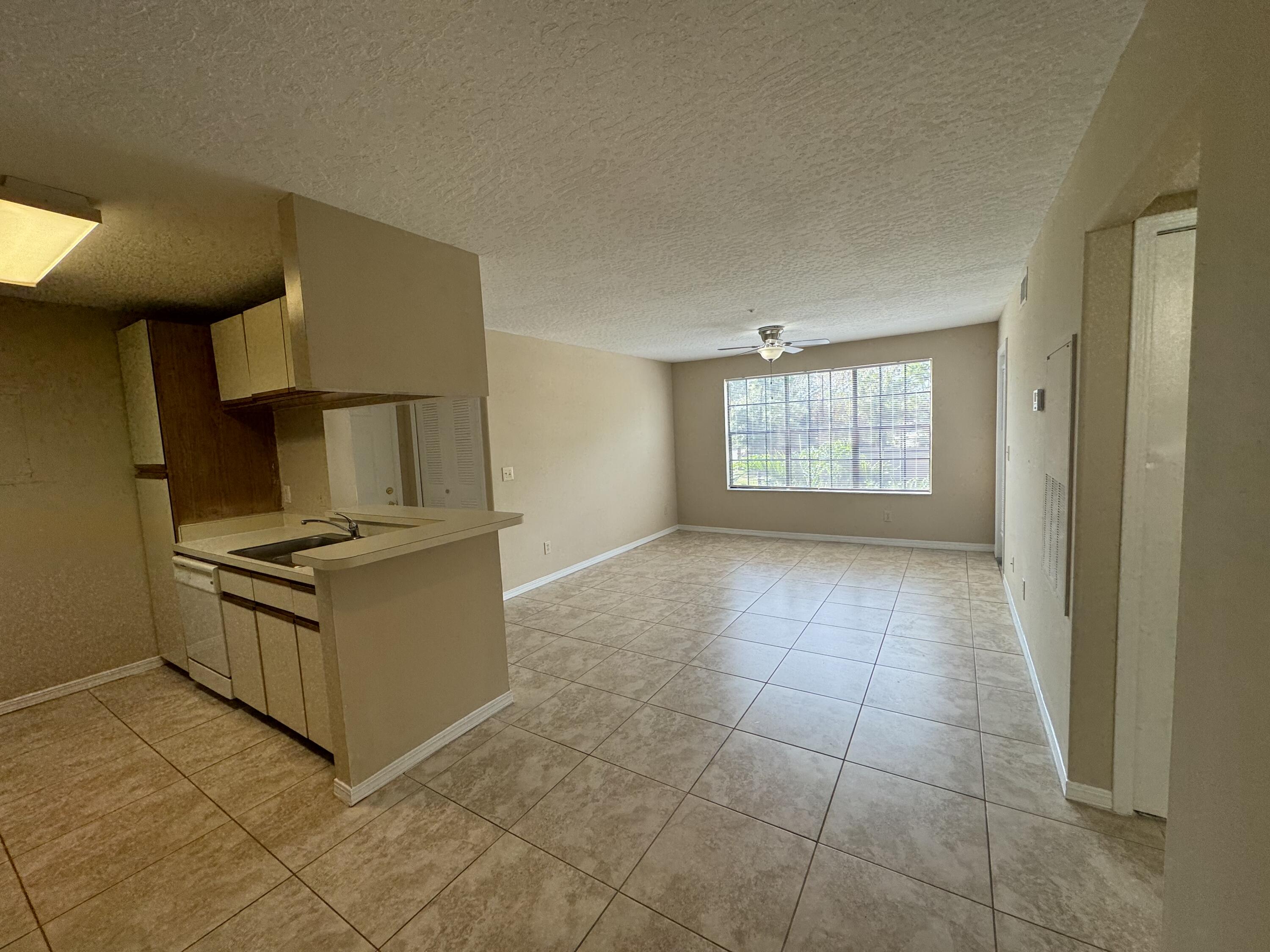 7667 North Wickham Road, Unit 613 Melbourne, FL 32940 - Photo 3 of 19 IMG_0484