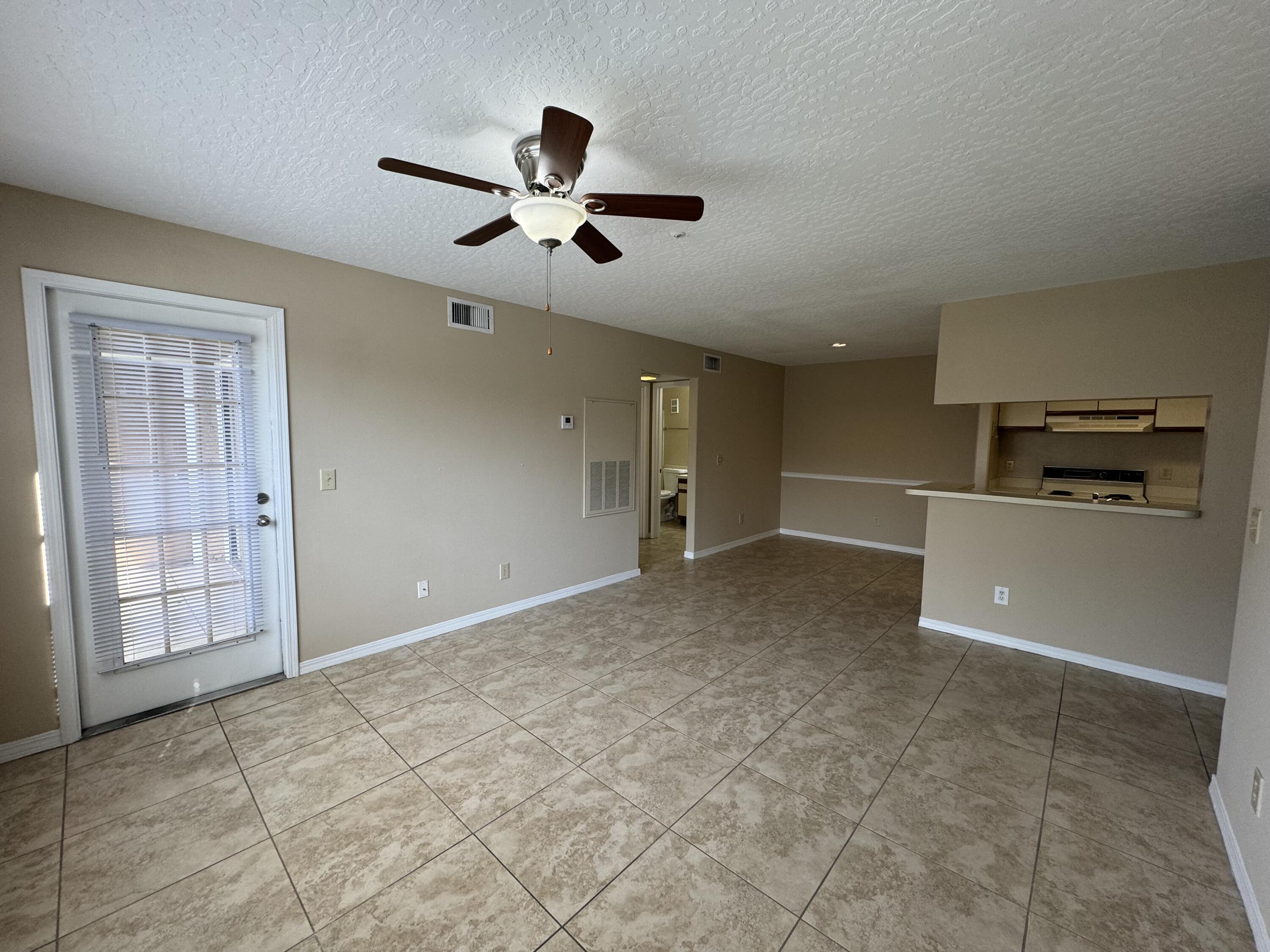 7667 North Wickham Road, Unit 613 Melbourne, FL 32940 - Photo 4 of 19 IMG_0488