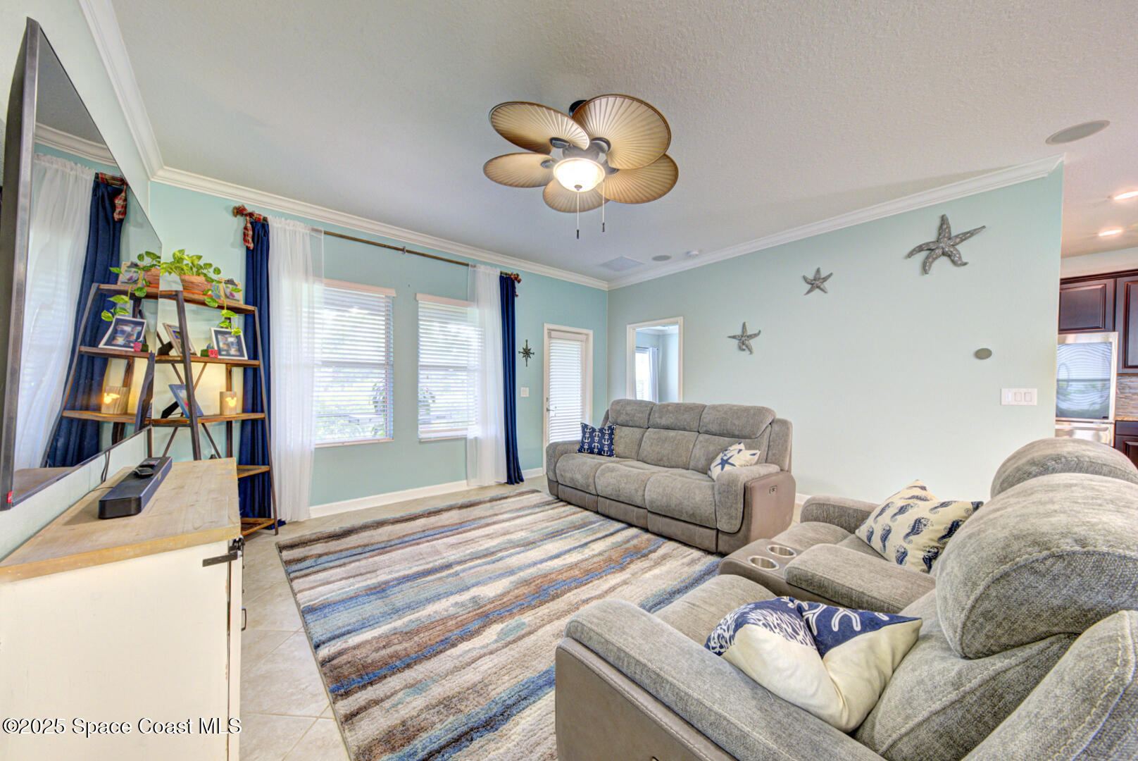 3142 Dark Sky Drive Harmony, FL 34773 - Photo 35 of 54 a bedroom with a bed furniture and a large window