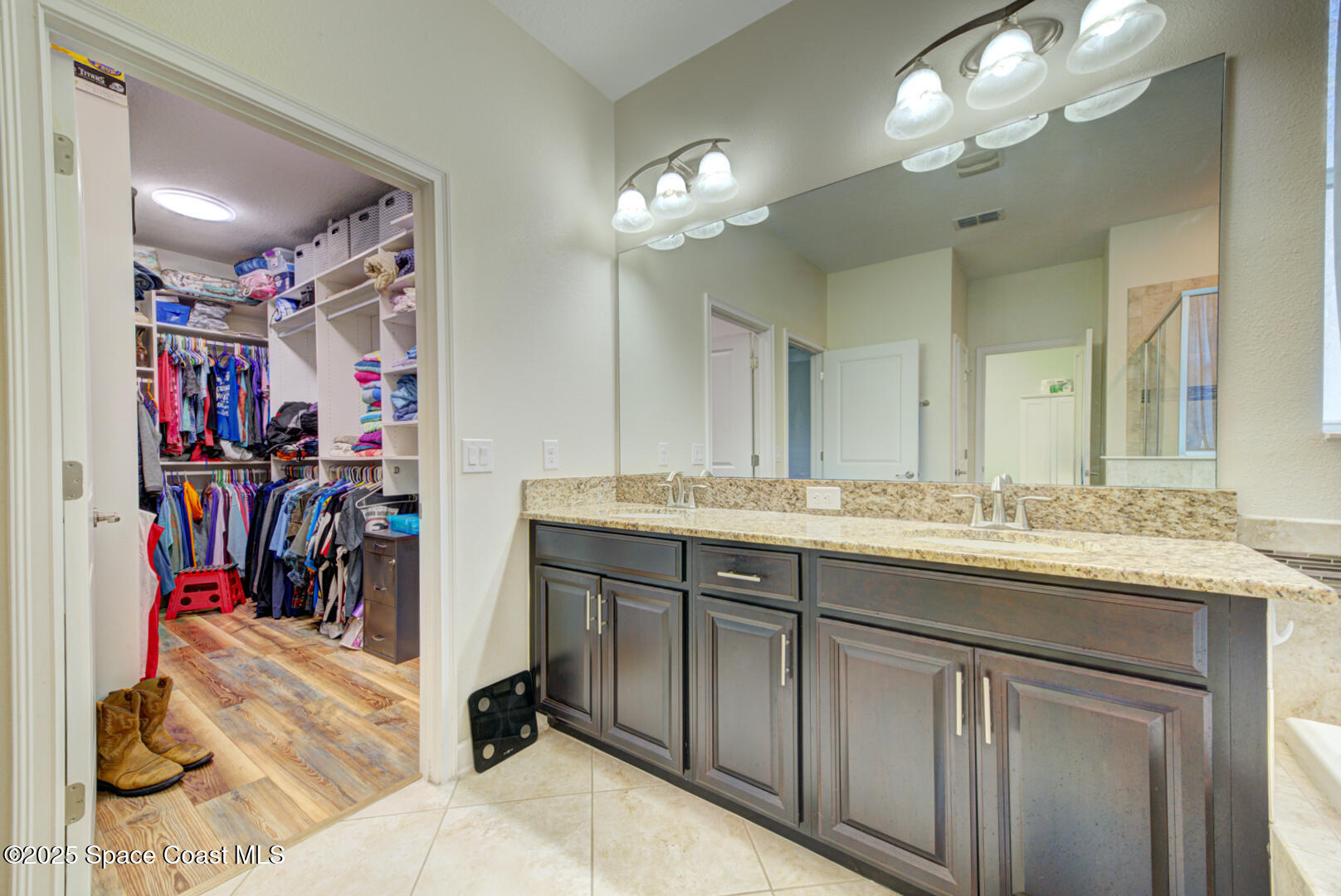 3142 Dark Sky Drive Harmony, FL 34773 - Photo 41 of 54 a view of a sink and mirror