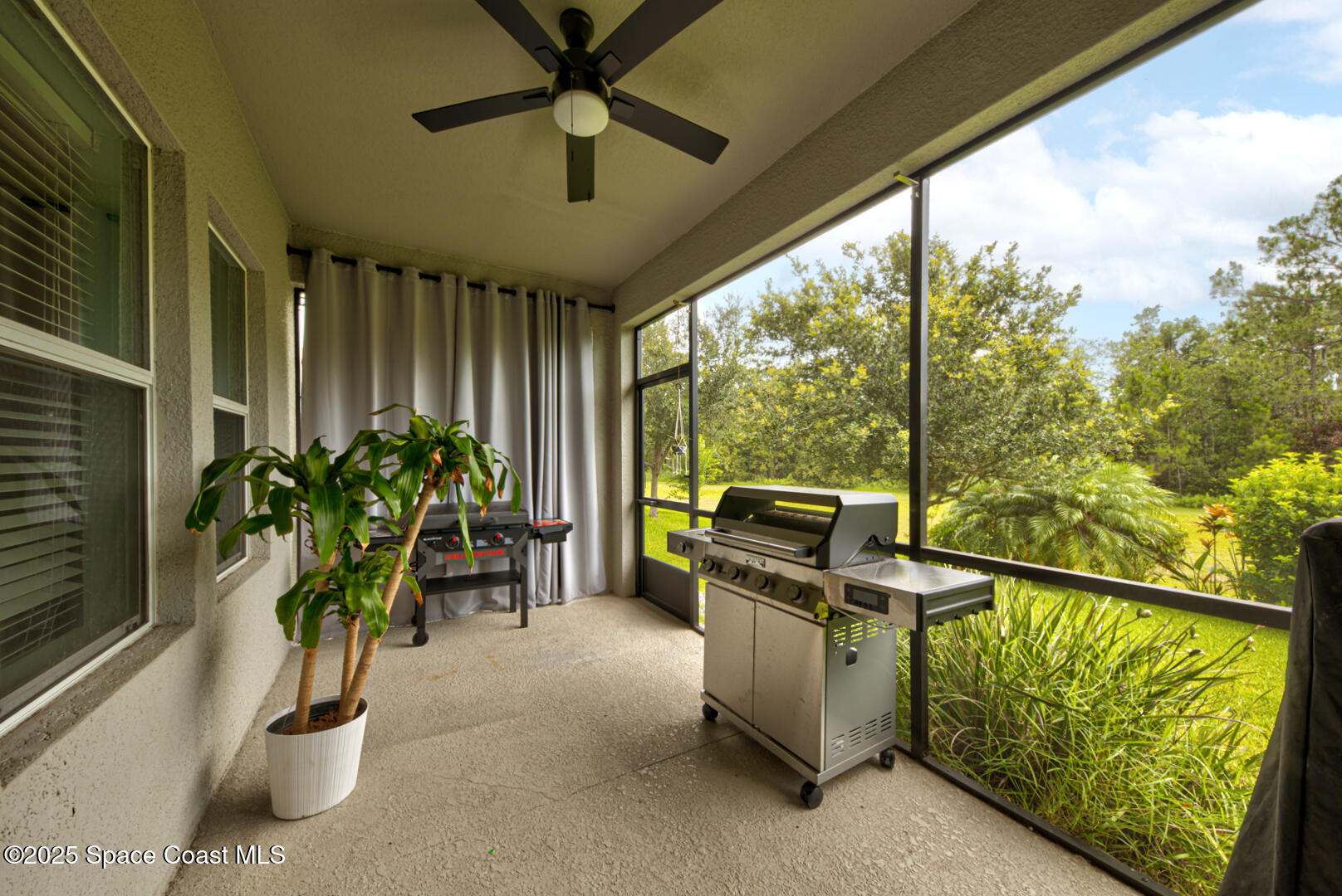 3142 Dark Sky Drive Harmony, FL 34773 - Photo 45 of 54 a view of a porch with furniture