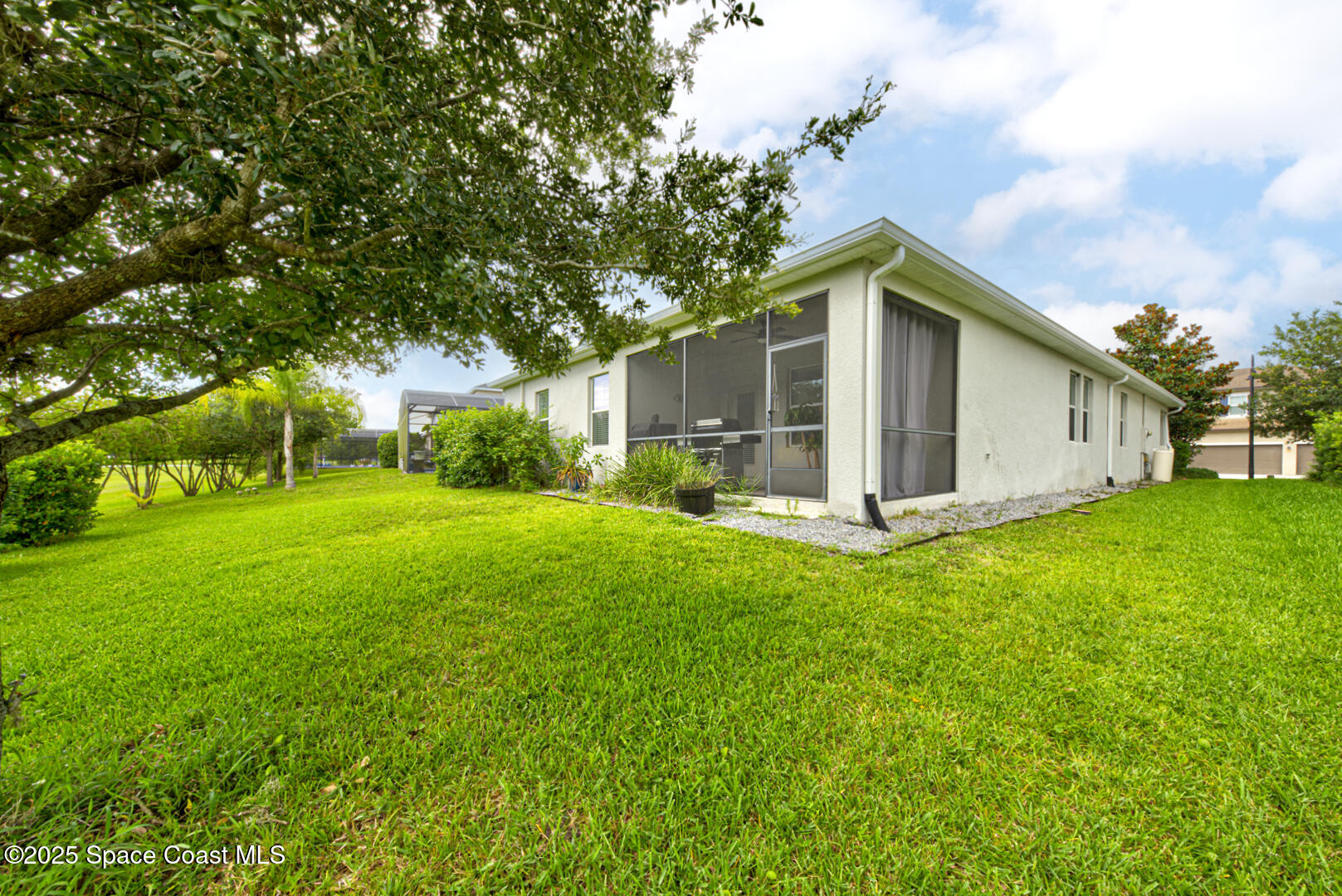 3142 Dark Sky Drive Harmony, FL 34773 - Photo 48 of 54 a front view of house with yard and green space