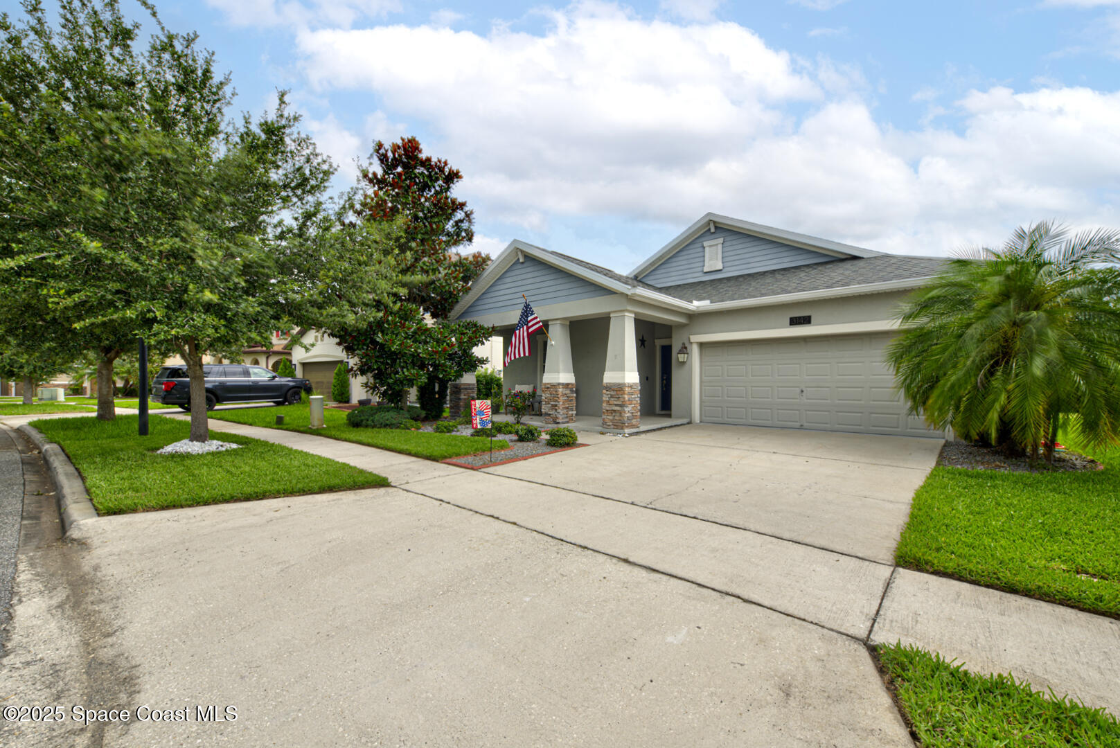 3142 Dark Sky Drive Harmony, FL 34773 - Photo 54 of 54 a front view of house with yard and green space