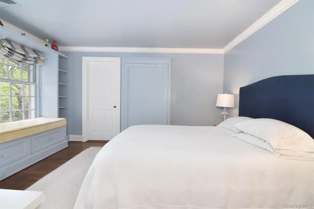 a workspace with furniture and a window