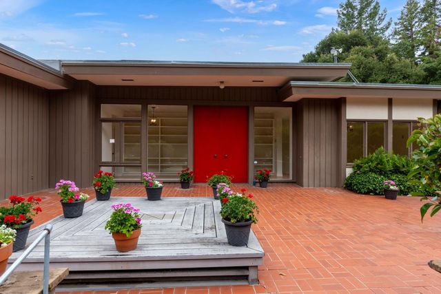 a view of a house with patio