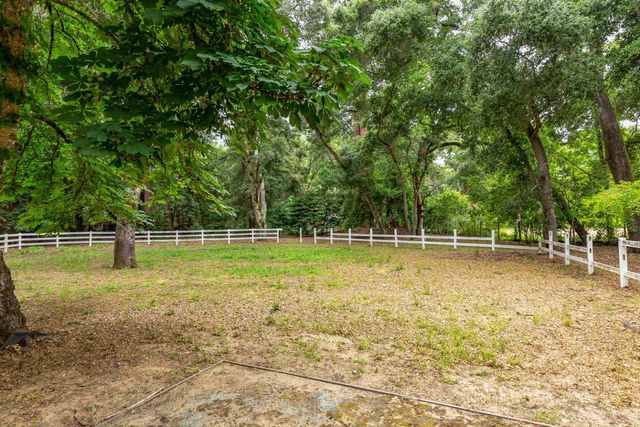 a view of a swimming pool with a lake