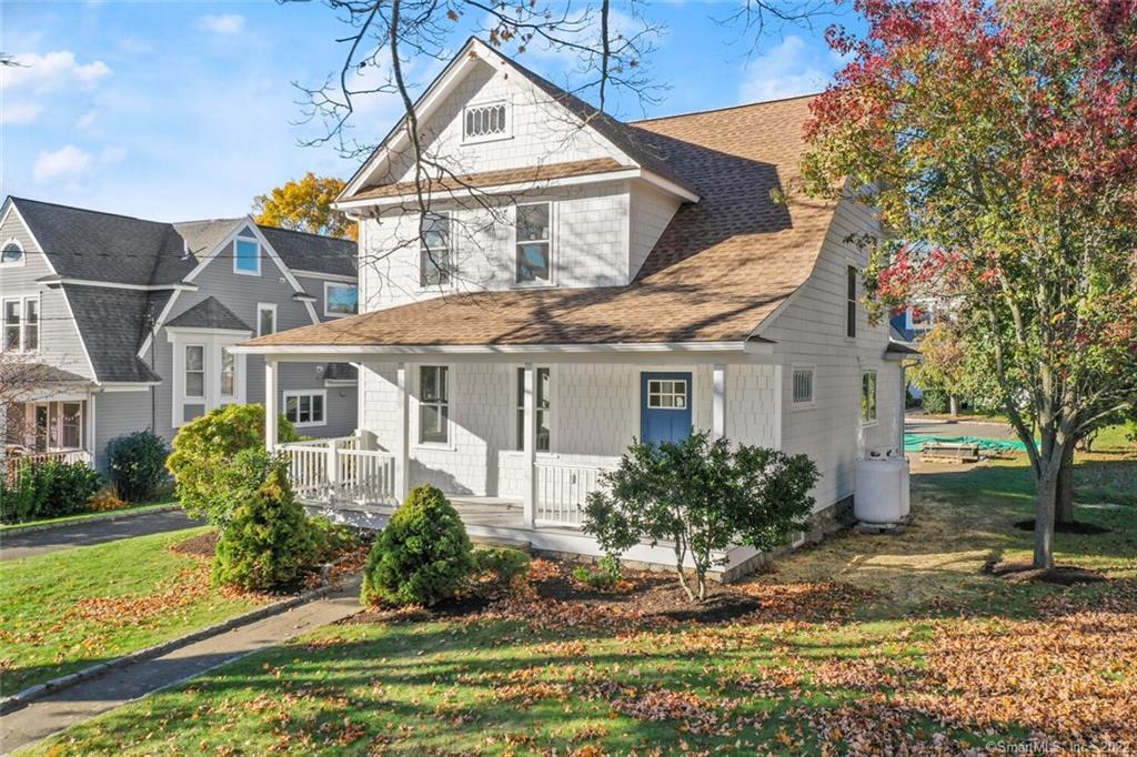 front view of a house with a yard